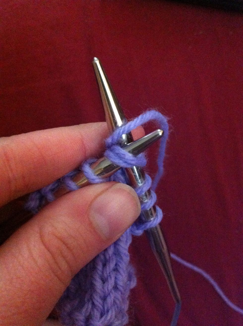 Wrap working yarn around left needle and pull it through the 2 stitches reducing them to one. Slip the new stitch to the right needle.