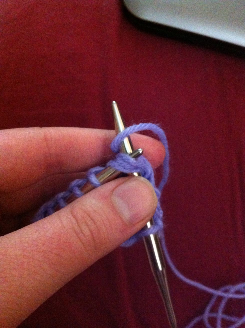 Wrap working yarn around left needle and pull it through the 3 stitches reducing them to one. Slip the new stitch to the right needle.