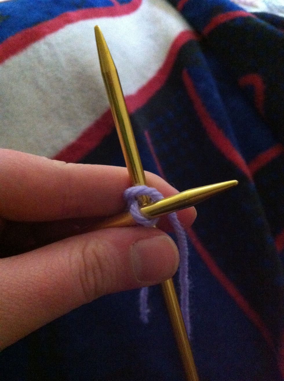 Wrap working yarn clockwise around right needle.