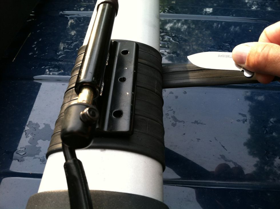 Wrap your cross bar without overlapping the edges of the innertube so that it's wrapped as wide as your mount and forms a nice flat cushioney surface.