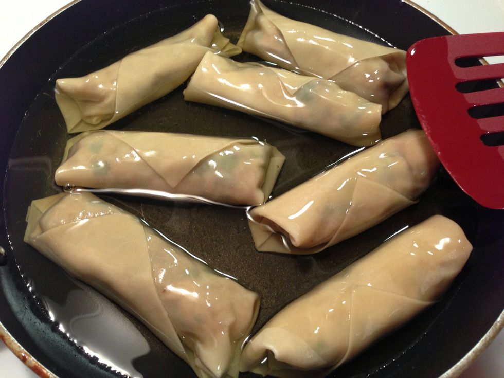 Wrap your egg roll wraps and fry both sides