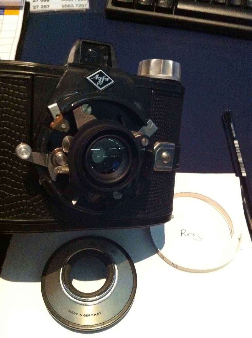 Wriggle off the clack housing and put that, the. Ring and the little screw in a safe place.