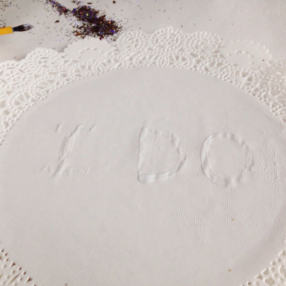 Write desired letters or phrase on your doily with a thin paintbrush and Mod Podge. Feel free to use a pencil first!