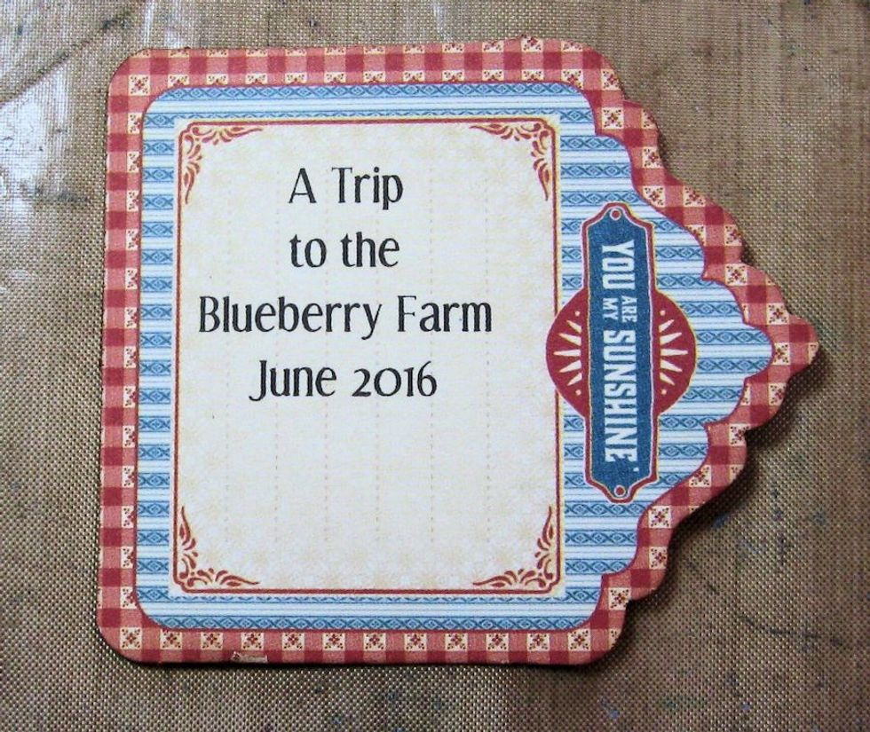 Write or computer journal album title onto a tag from Tags and Pockets.