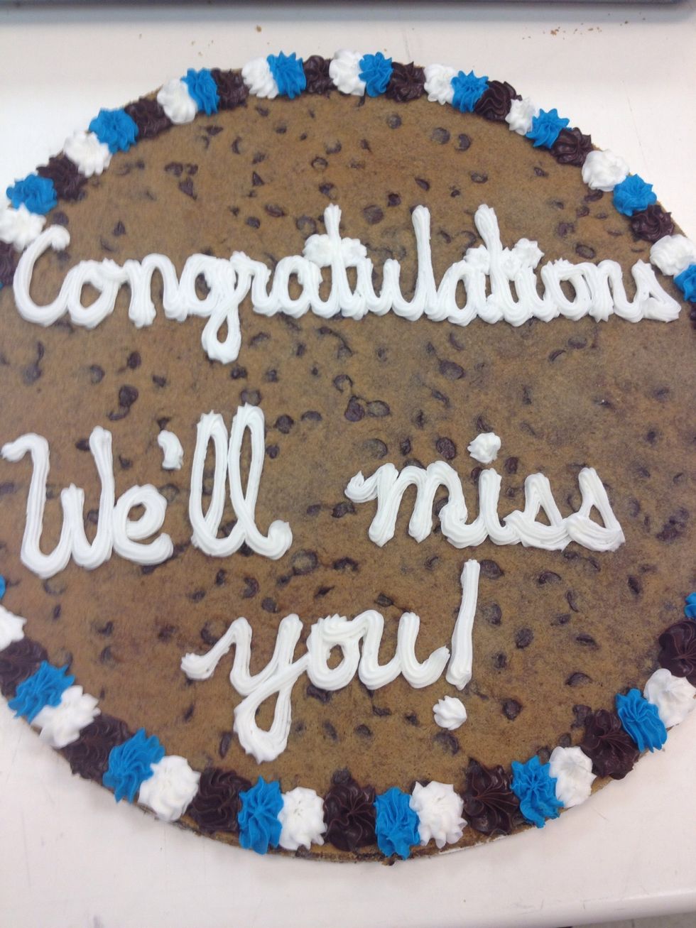 Write the message either in white or a lighter color icing. Using a #18 tip.