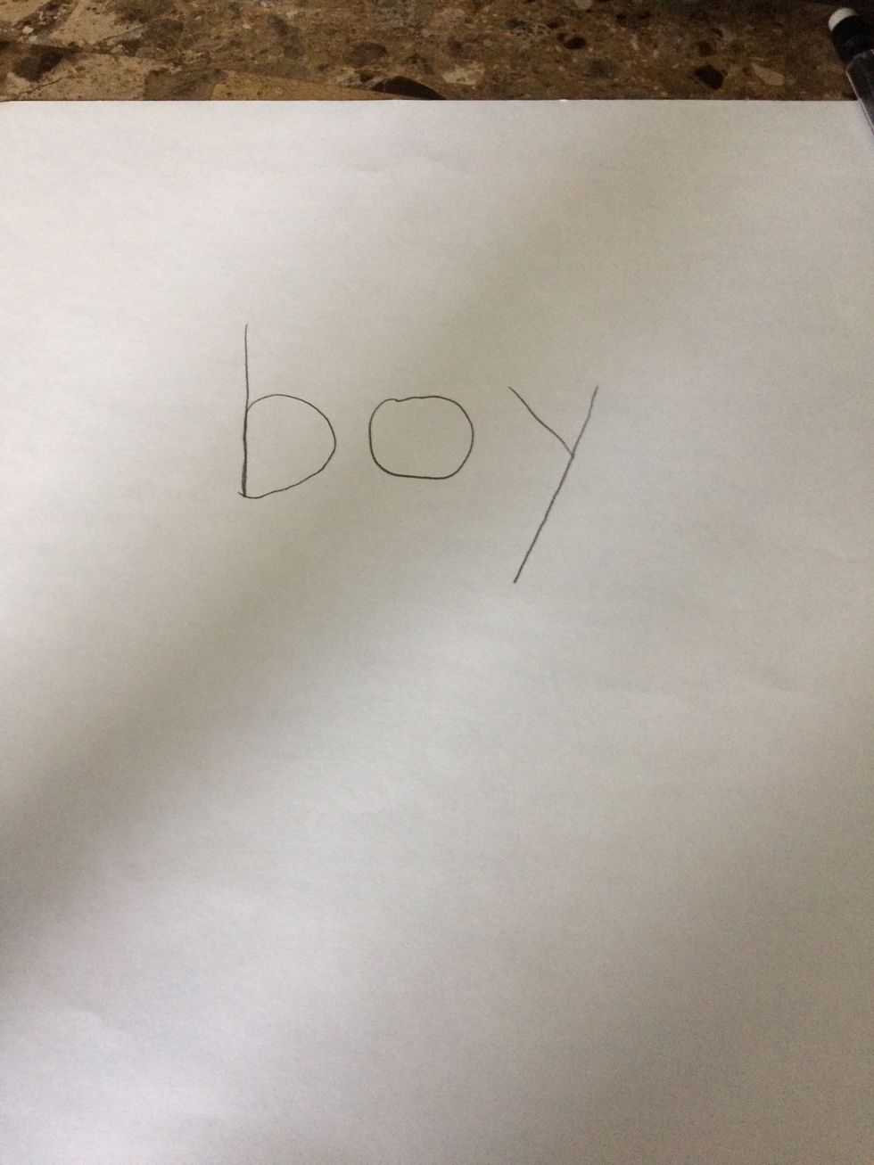 Write the word boy in the middle of the paper