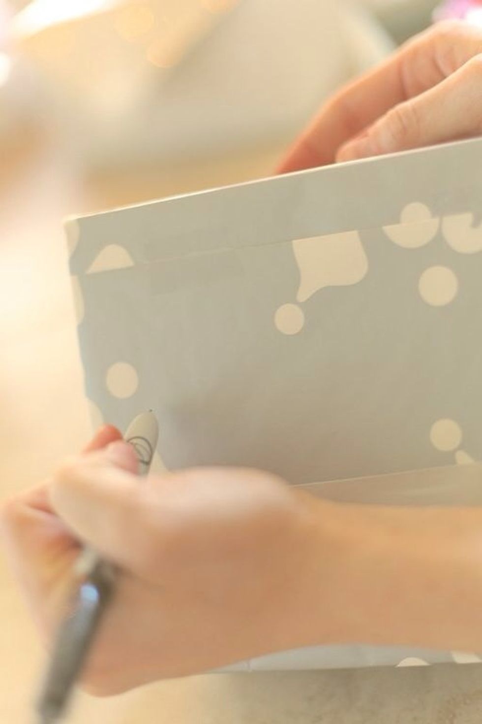 Write "to" and "from" on the bottom of the gift... No need for those silly stickers :)