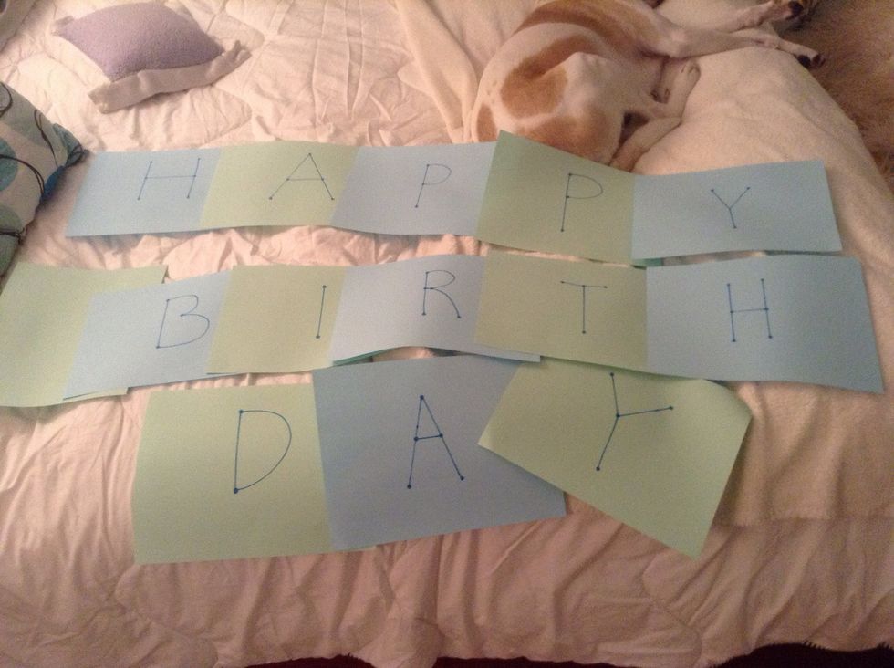 Write your happy birthday message in marker on colored printer paper. Make sure you have one blank sheet. (Pardon the sleepy pit bull!