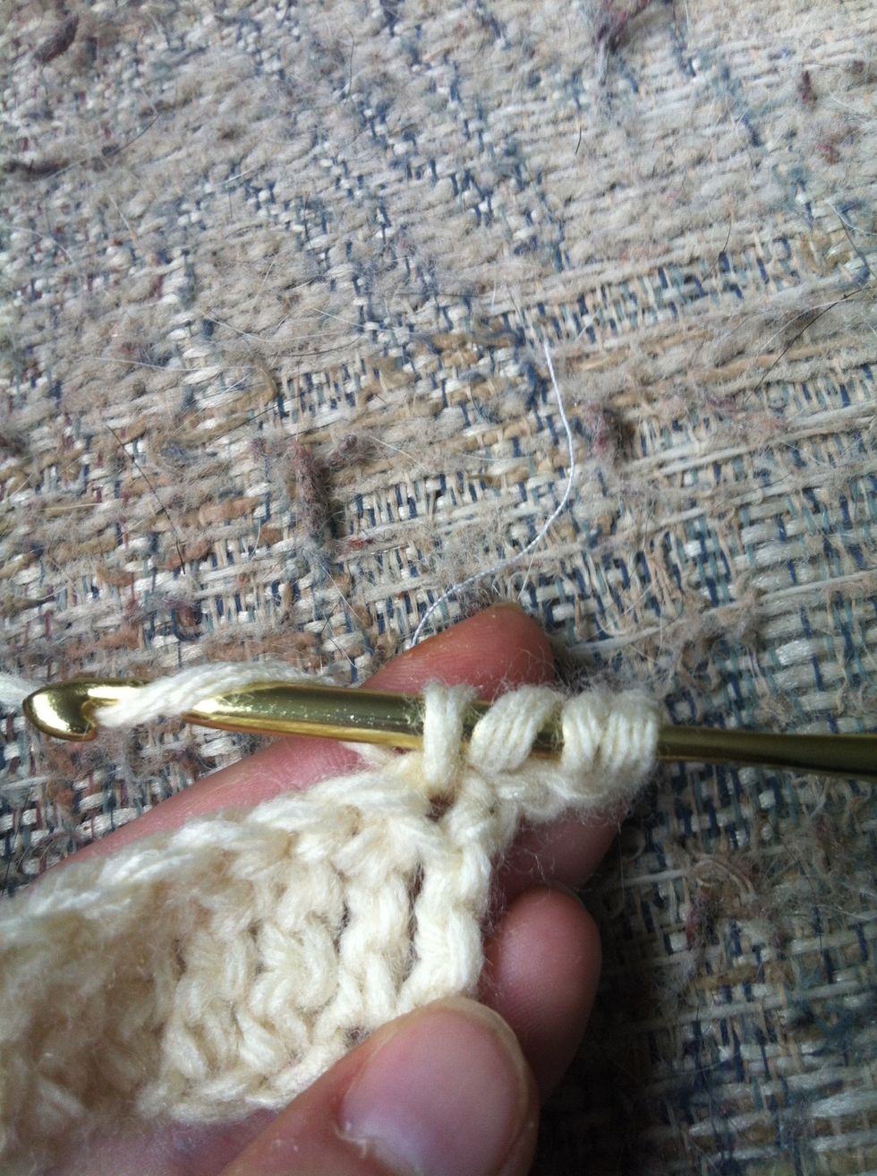 yarn around and pull trough the first loop (the top of the previous treble crochet). you'll have 4 loops on your hook again. yarn around