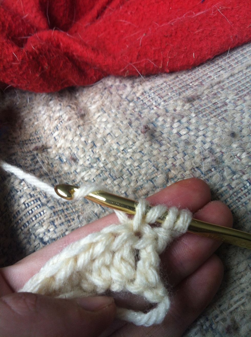 yarn over and pull through the top loops. now you have 4 looos on your hook again.
