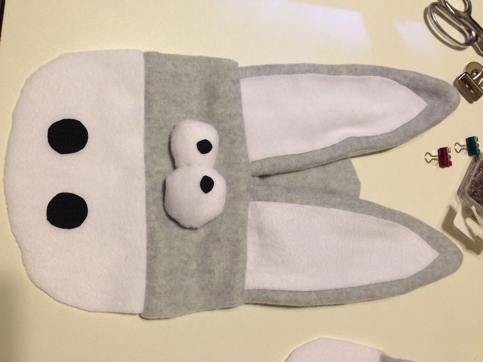 Yeahhh should look like this when finished. Now take the face bottom and place it upside down onto the face (eyes). We're going to sew the bottom face on. The seams shouldn't be on the inside