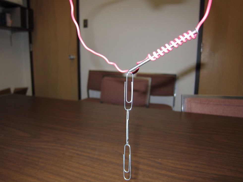 Yes! It picks up three paper clips!