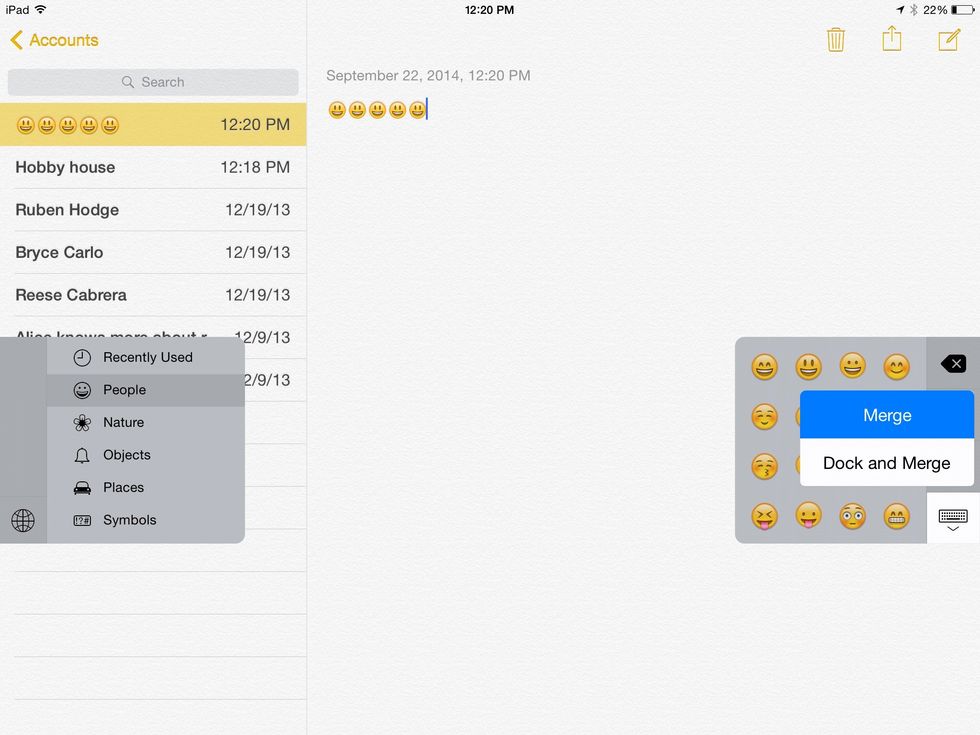 Yet again hold down the keyboard button then move your finger up to merge button.