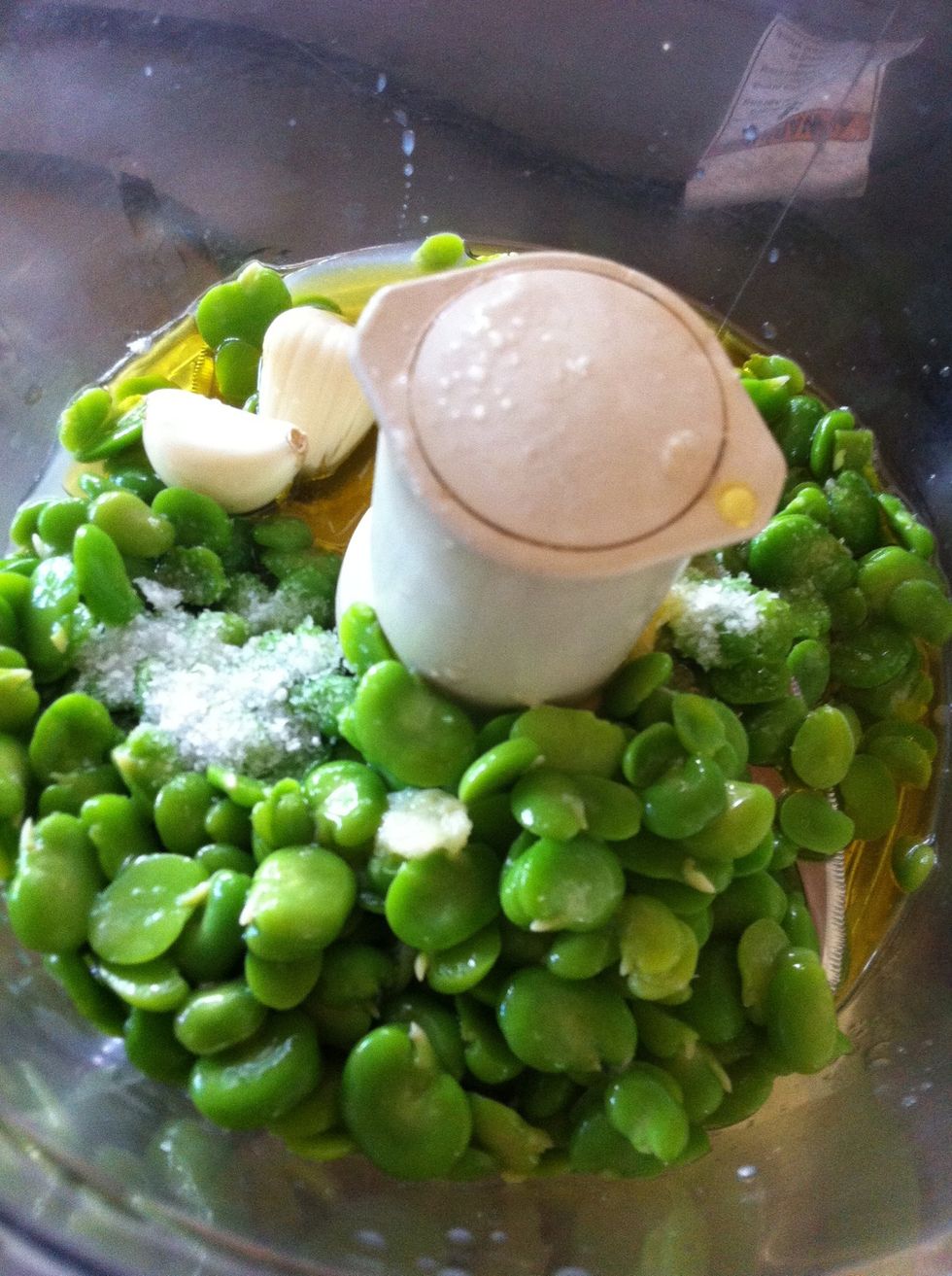 Yield was 1 1/2 cups of beans Add garlic, salt, olive oil, and lemon juice with the beans in a food processor.