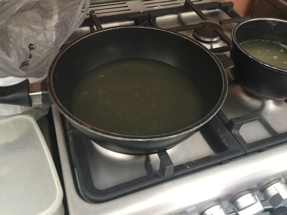 You are able to tell that the stock is boiling when there are bubbles and the water has reached the temperature of 100 degrees C.