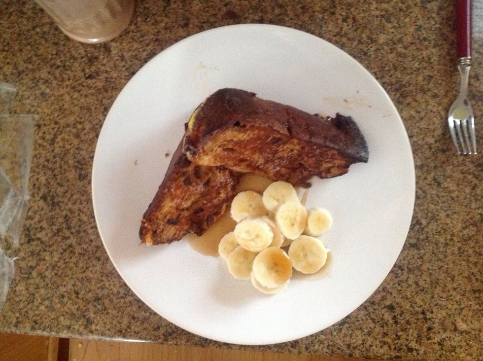 You are now ready to plate your dish. Add some fresh fruit. Any fruit will do, but bananas are a great accompaniment with the dish.