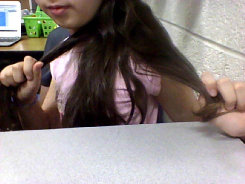 You brush your hair until it is smooth. You put your hair into 3 sections. It doesn't matter how big or small it is!