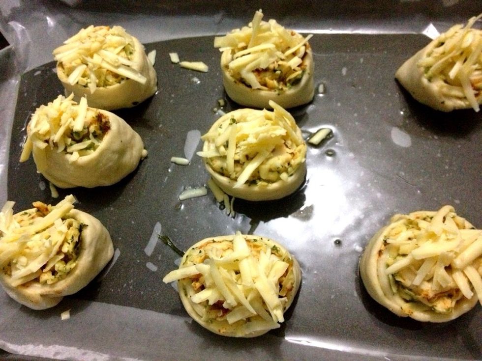 You can add more grated cheese just before these lil cuties going into the oven. Bake for about 20 mnts or until brownie