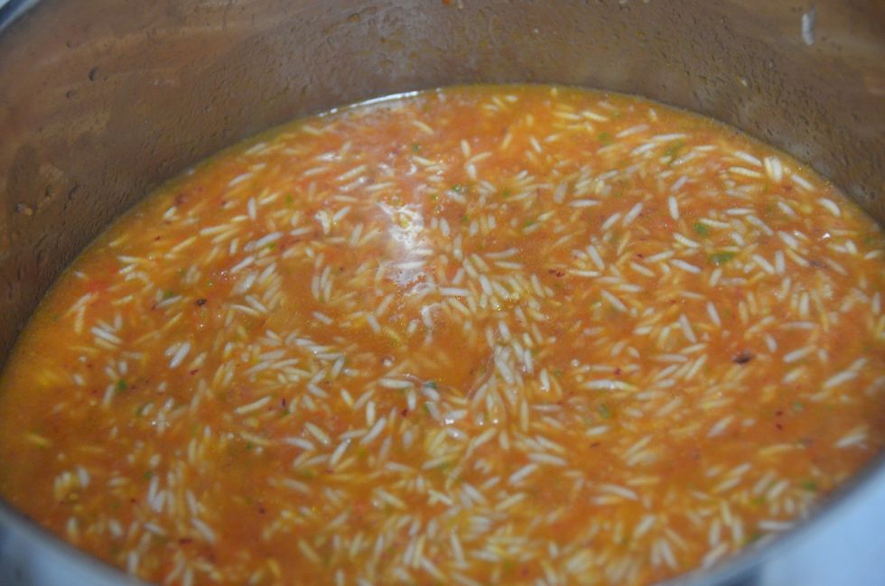 You can add more water if you think the pur\u00e9e is too thick. Add salt and stir the rice. Cover and cook (15 min)until rice is completely cooked and the pur\u00e9e is absorbed.