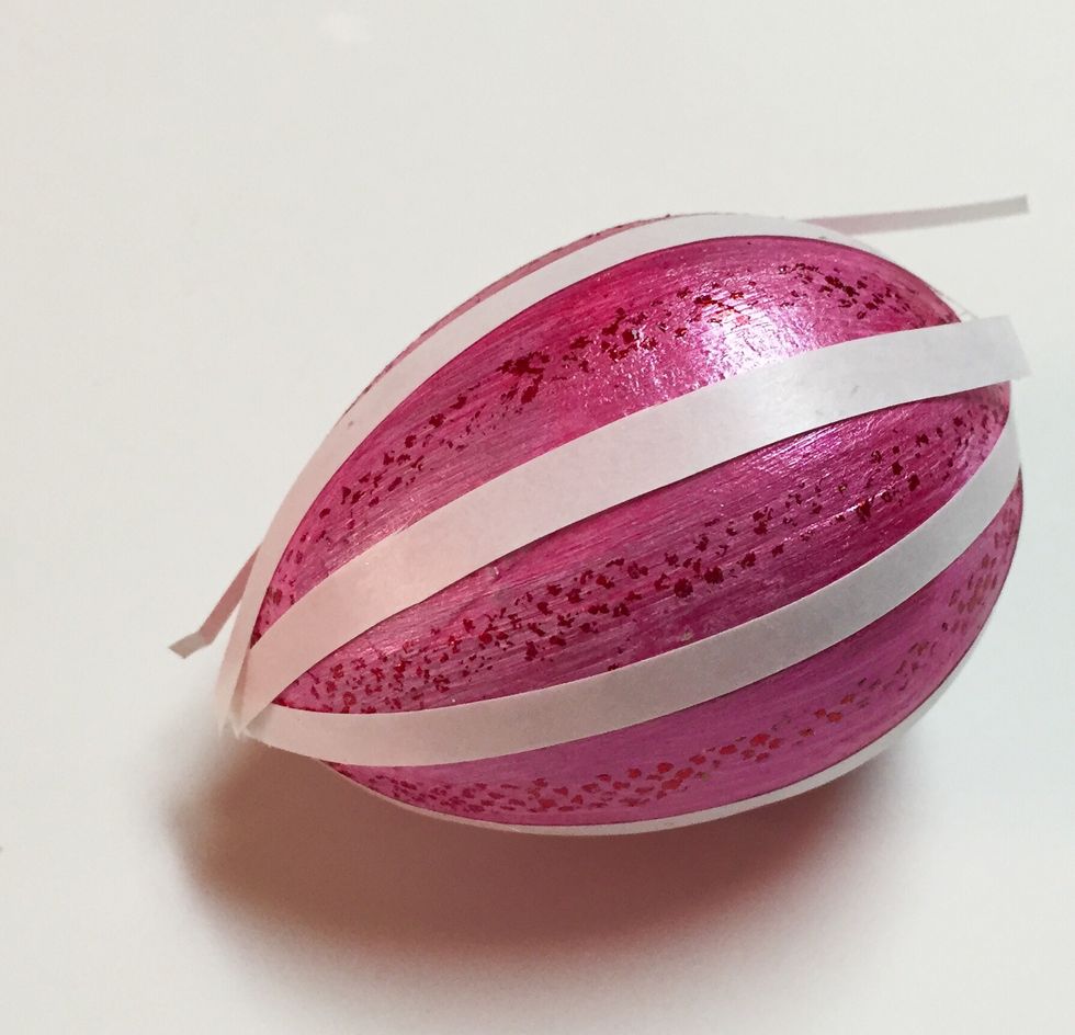 you can add one or more sets of stripes to the egg and use multiple colors of foil. here another set of stripes has been added in between first set.