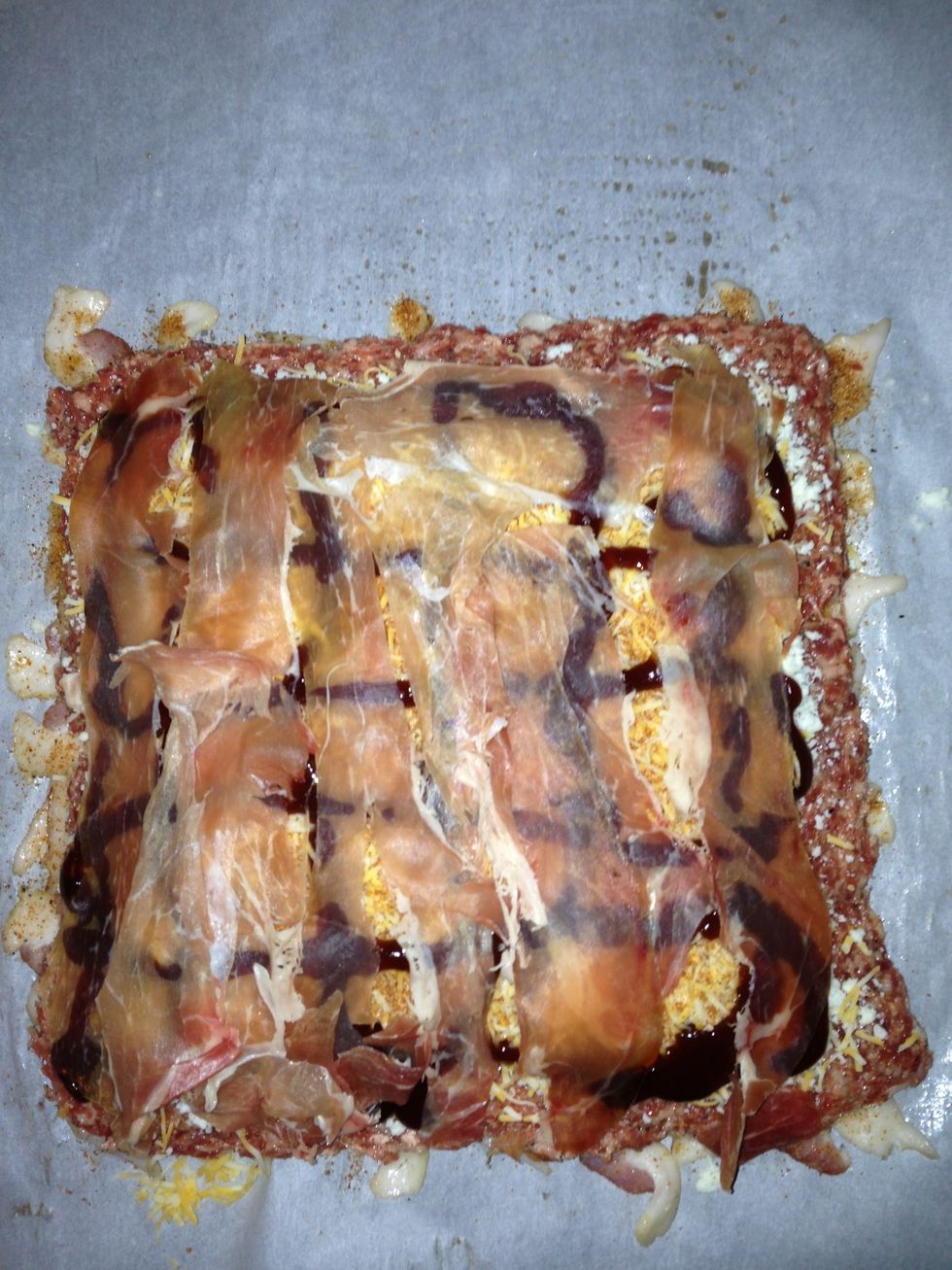 You can add some other meat now if you want.  This is prosciutto, but you can use pepperoni or even thin slices of salami.  .