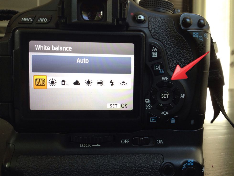 You can adjust the white balance by clicking the "up arrow."