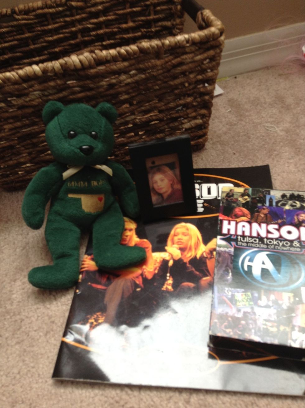 You can also add cute little band merchandise to your basket! Like for example, I have here a video, a bear, a book, and a picture of Zac Hanson! Notice how it's all band related stuff.