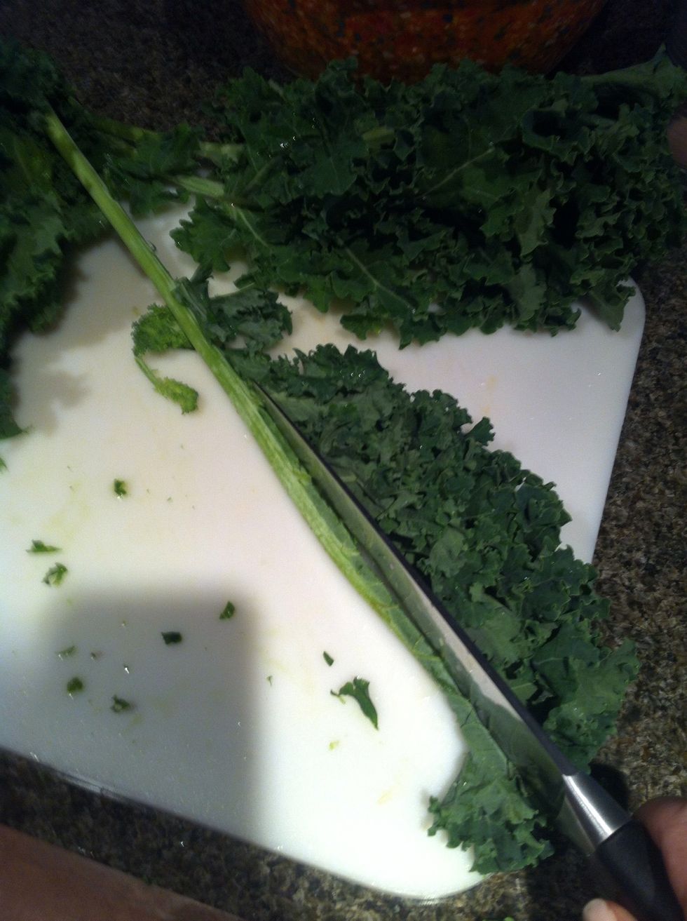 You can also fold the leaves and cut rib. Don't worry about the small lighter color leaves they can be tossed. but do pull off the nice dark leaves even if small.