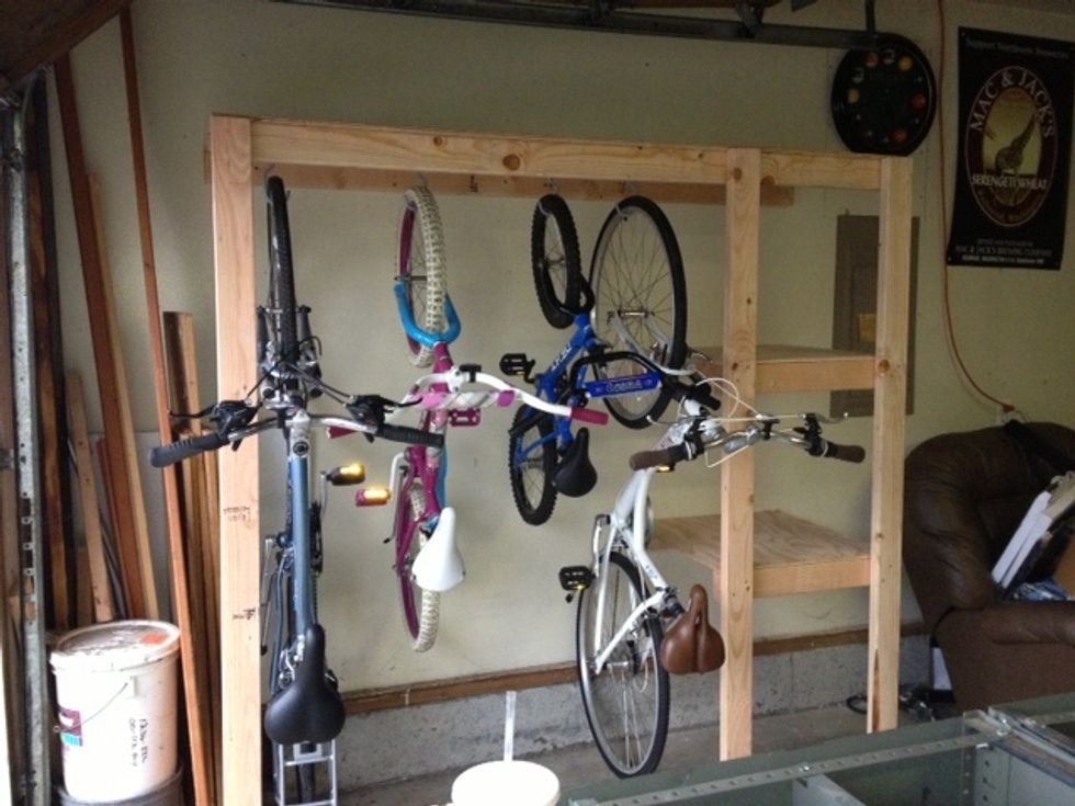 You can also place bike hooks in the opening that you left as well. This is the other shelf we built the same day.