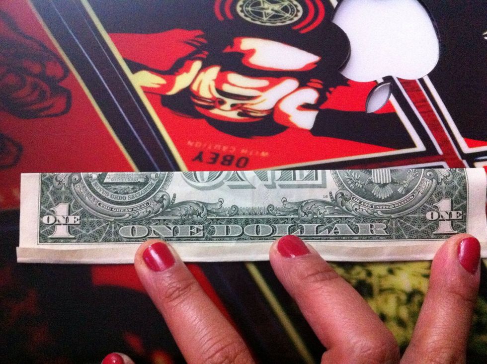 You can also take a coin to make sharp crease lines on the bottom part.