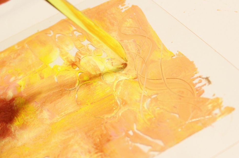 you can also use the end of the paintbrush to draw designs...