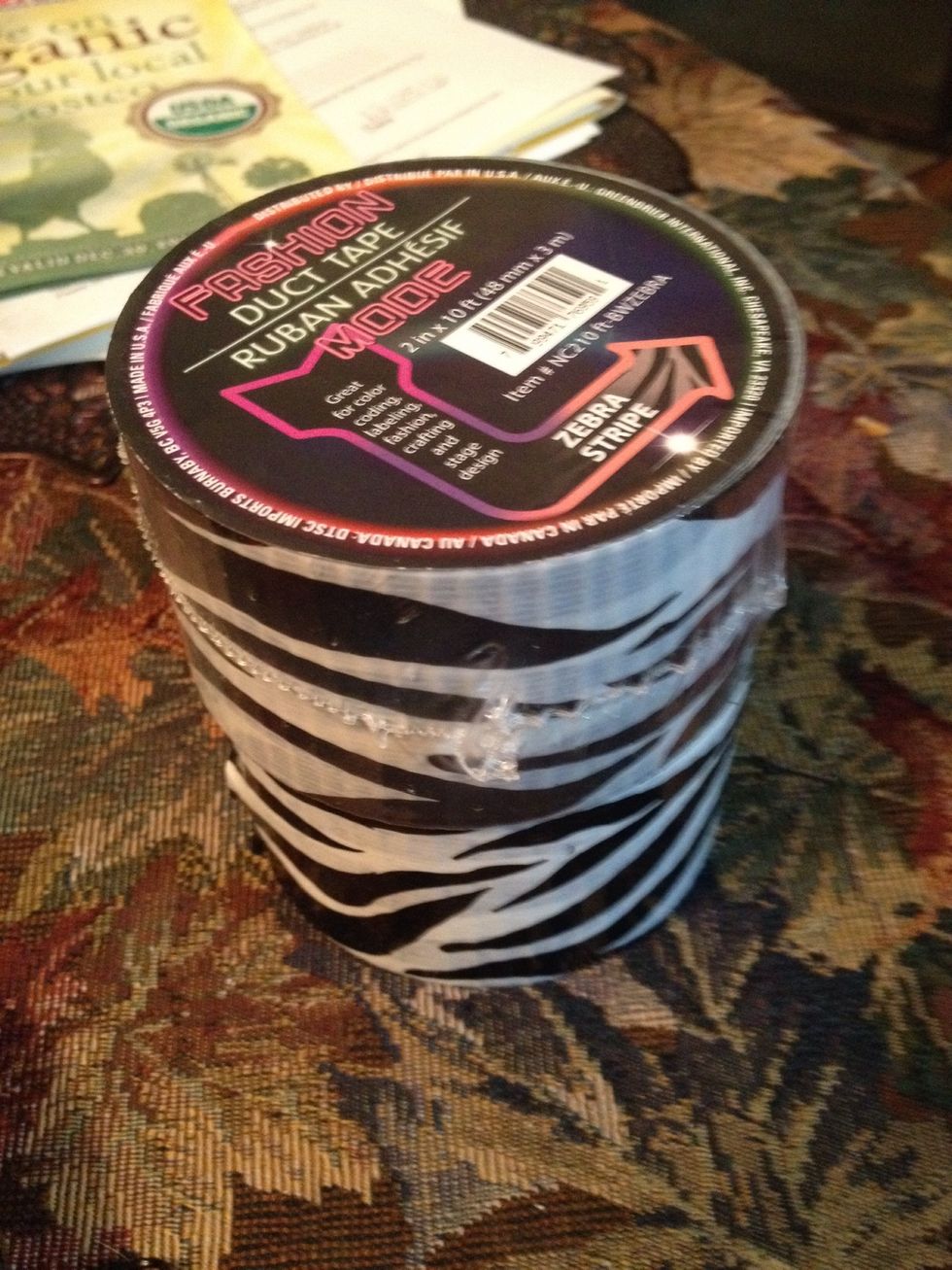 You can buy decorative duct tape at craft stores at Beverly's and at Costco, but I got lucky and found mine at the dollar store. :D