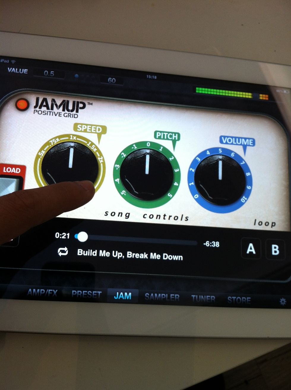 You can change the song speed, transpose the song (so you don't have to change the tuning of your guitar) and tweak the track volume.