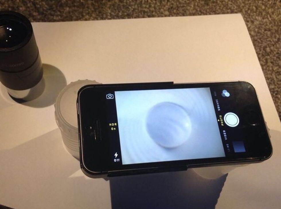 You can check that the case is glued in place correctly by using the camera to make sure the circle is in the centre of the screen