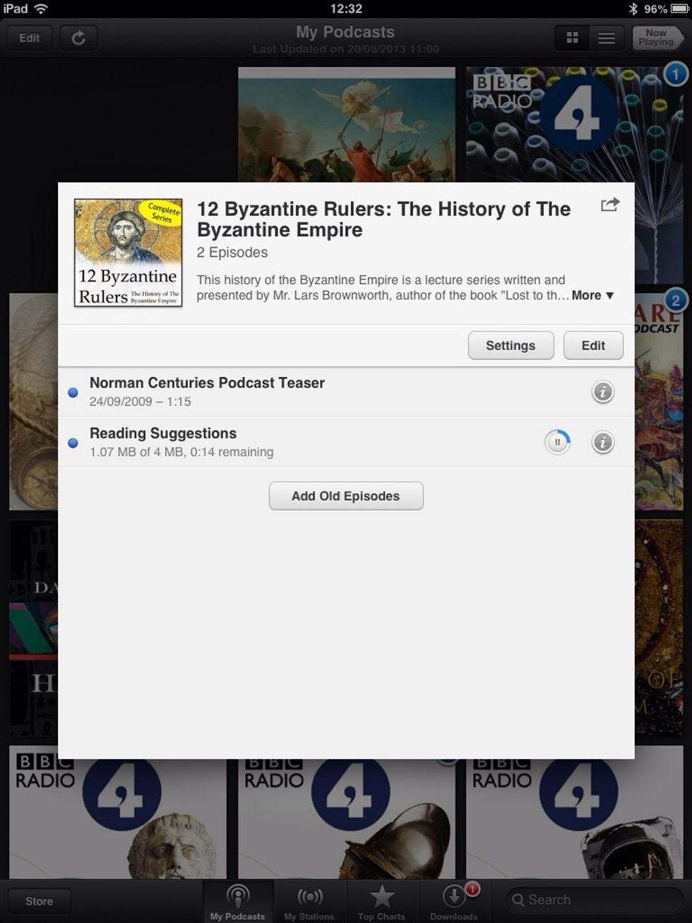 You can check the download progress by observing how the circle around the pause sing is being filled with blue. Await until the circle is full to play the episode.