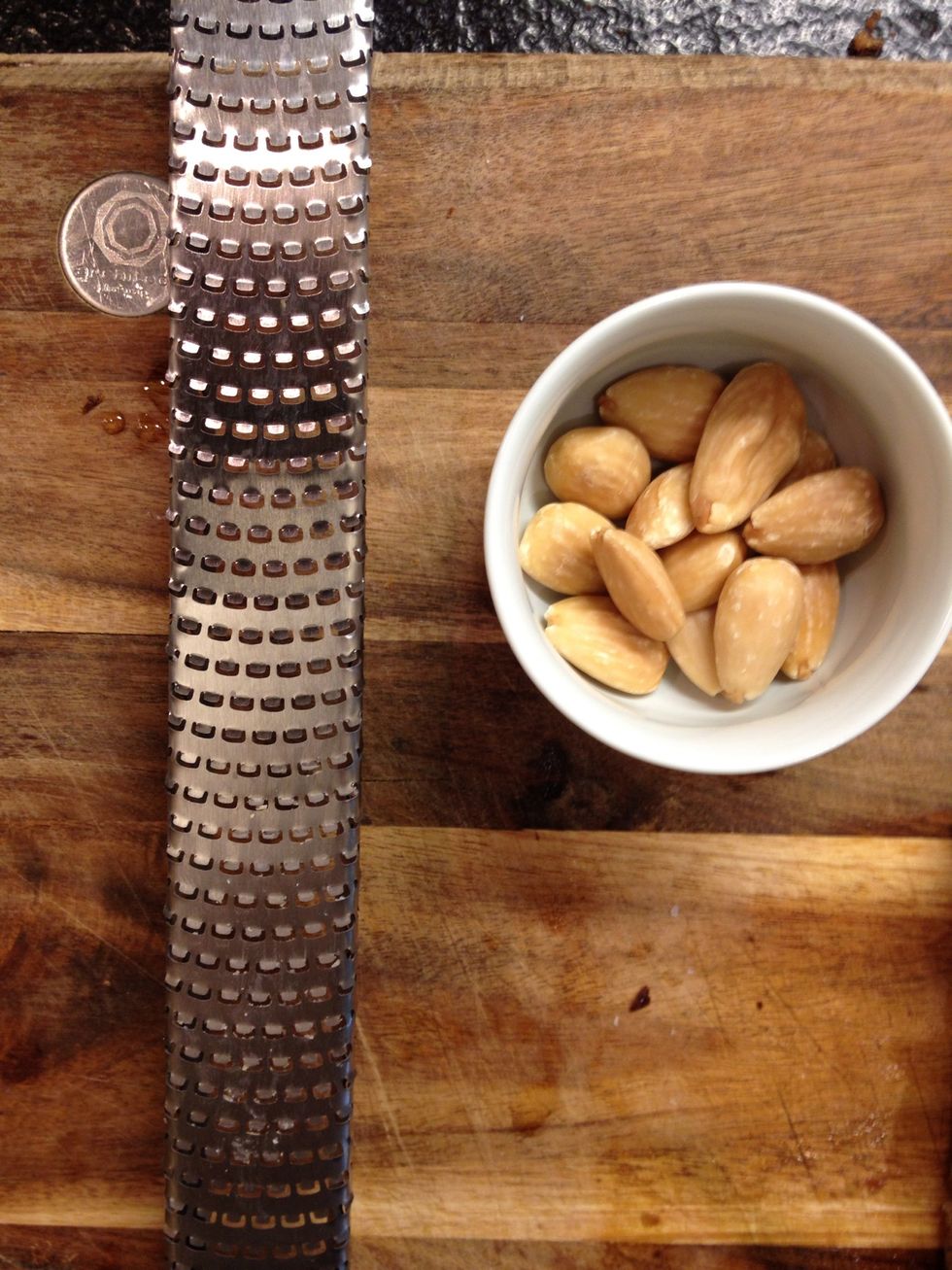 You can chop chop some almonds or just grate it like cheese.