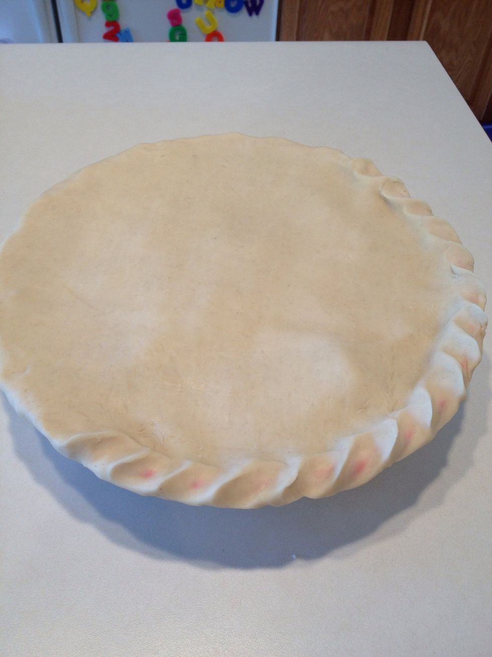 You can design your edges any way you like. I like to make a rope design for my apple pies by pushing the dough between two fingers diagonally.