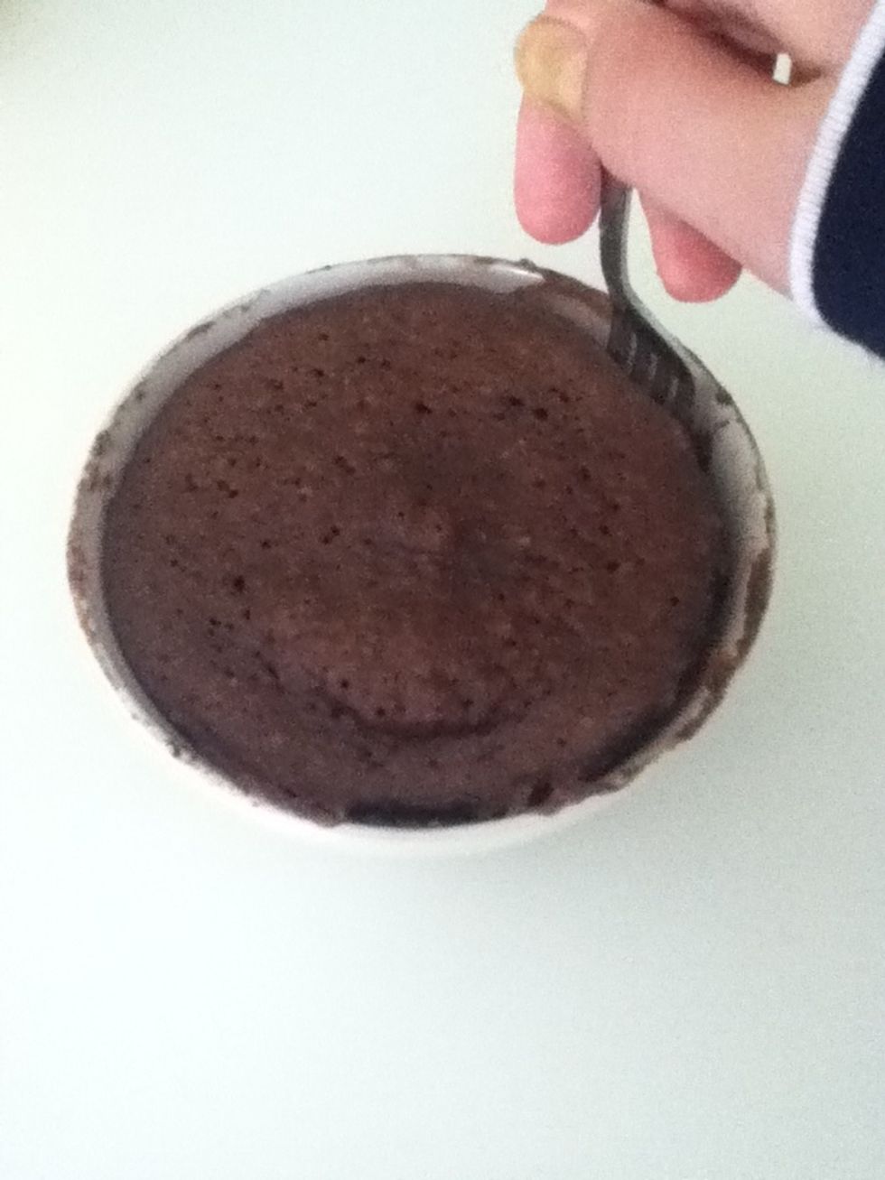 You can dislodge it from the sides with a fork