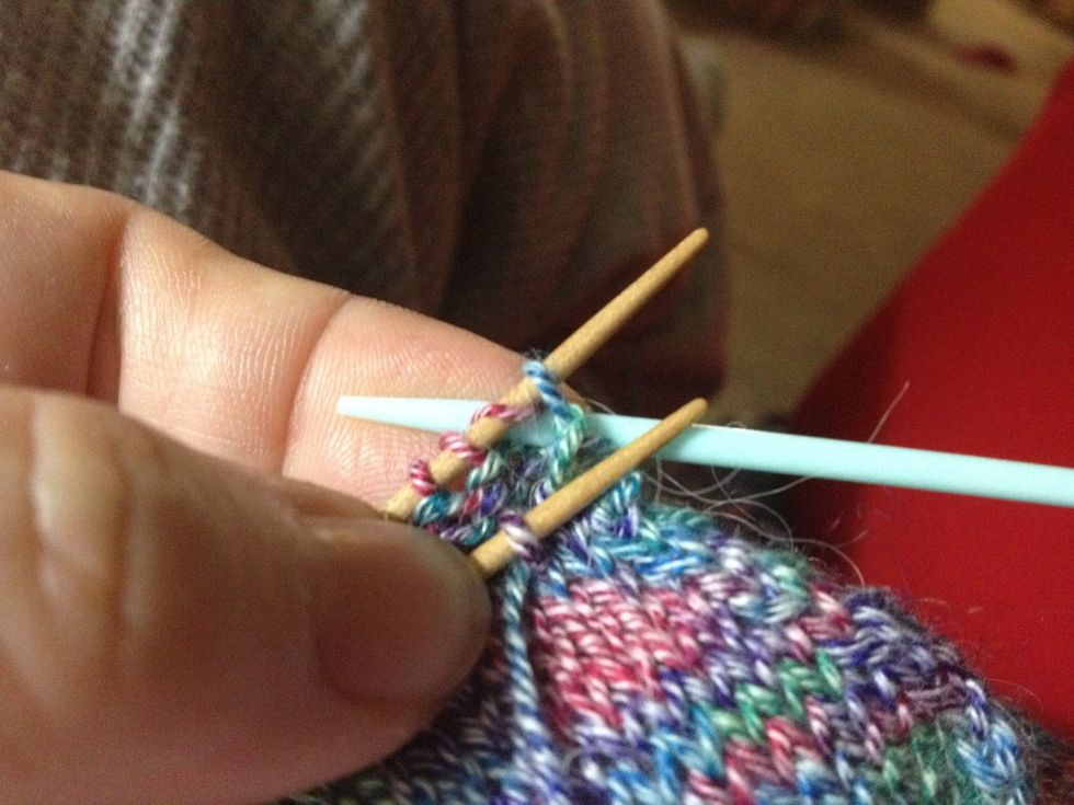You can do the same two-in-one on the back stitches by going purlwise through the 1st stitch then knitwise through the 2nd stitch -- all on the back needle -- and drawing the yarn through in one pull.