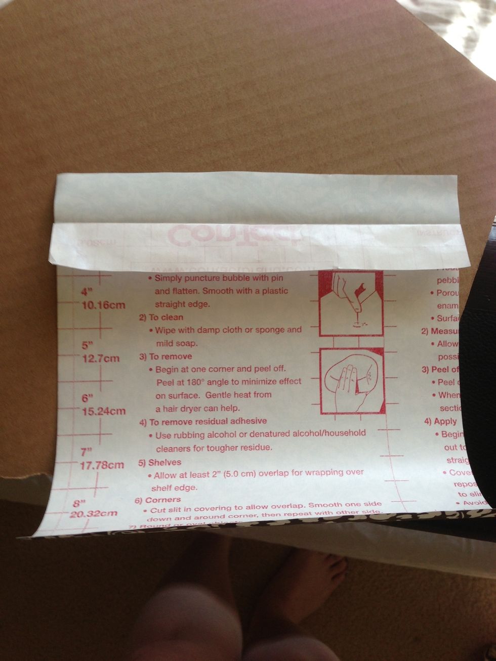 You can do this by pulling off that much of the contact paper's backing.