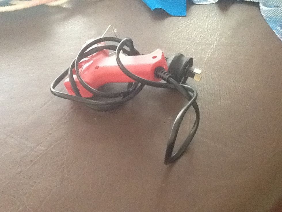 You can do this first but I like to do it now and that is plug in your hot glue gun