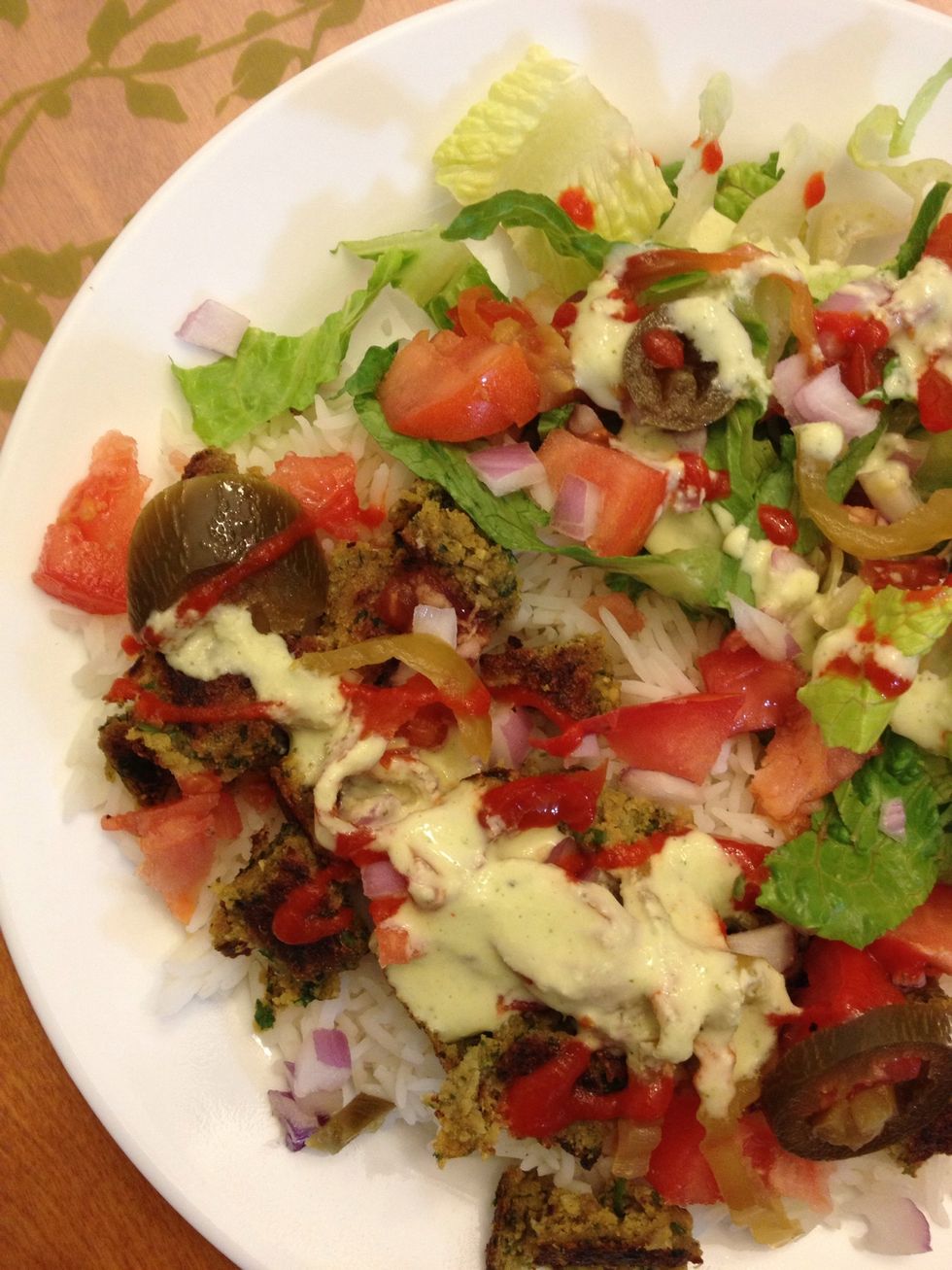 You can eat this anyway you want. I make rice, chopped veggies and add my homemade garlic and hot sauce. Just like a falafel plate at the restaraunt a.