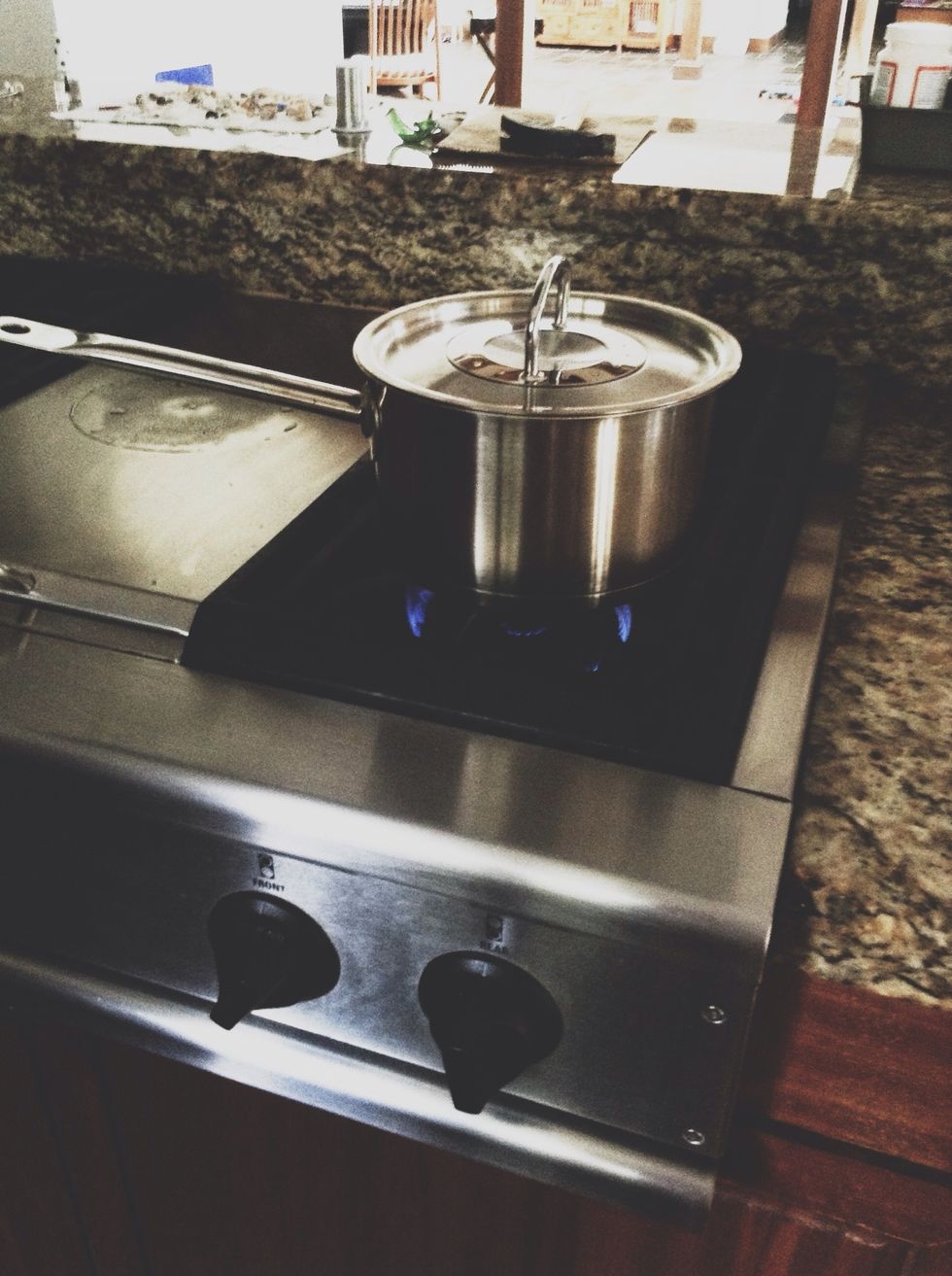 You can either fry or boil the dumplings. If you boil them, place a pot on the stove on high temperature. Wait until the water is boiling.