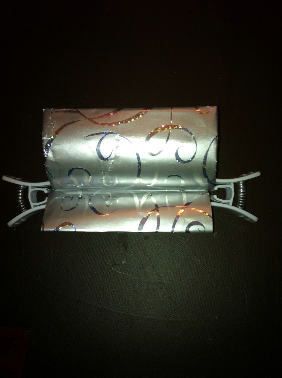 You can either hold the two pieces together while the glue is drying.... or secure it with two clothes pins instead. Your choice.