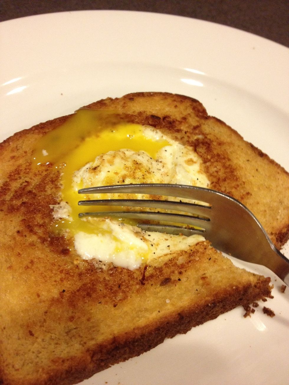 You can either use a fork or eat it like normal toast, but warning if you like it runny, a fork is preferred to avoid the mess. The nice runny yolk and the toasty bread makes a great combination.