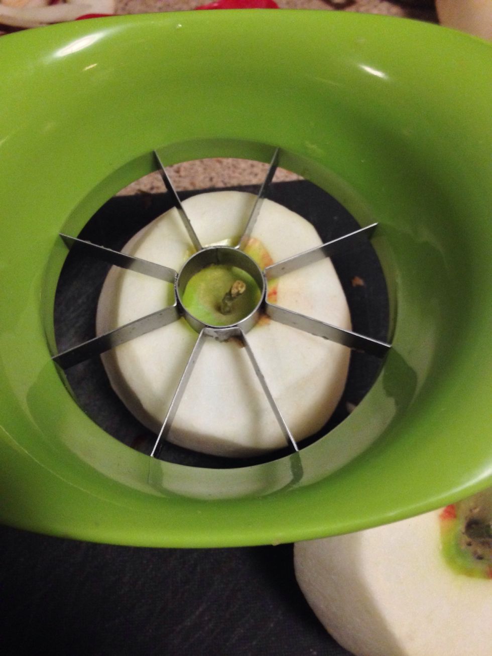 You can either use a knife or an apple corer to remove the core and throw the core in your compost.