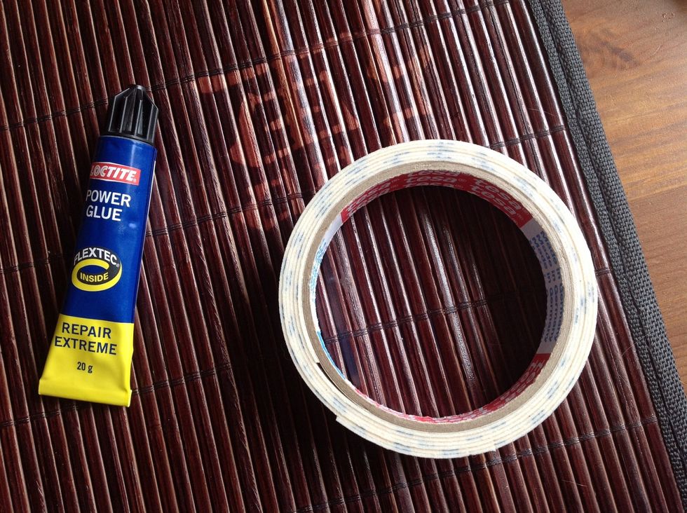 You can either use glue, hot glue, or double sided tape. Just use what is at hand. If you go for normal glue just make sure it's a strong one.