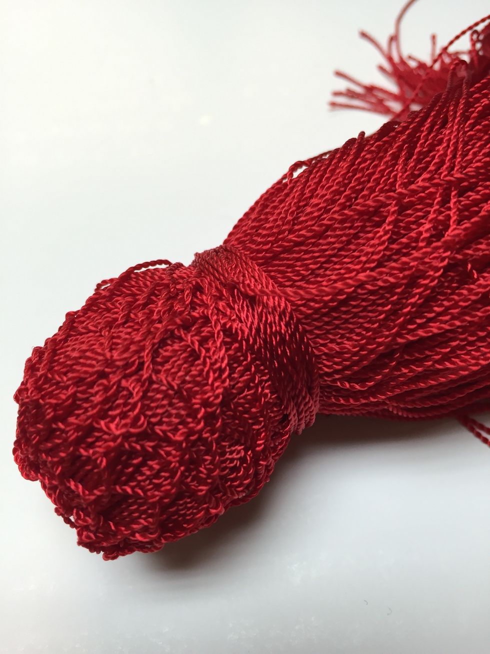 You can embellish the top portion of your tassel by doing embroidery stitches. I have used a blanket stitch, it is of course totally optional!