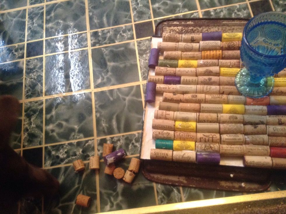 You can fill in the gaps any way you like. We cut some corks in half with outdoor scissors.