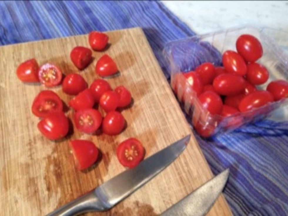 You can halve the cherry tomatoes or leave them whole. Then sprinkle them all with a good dusting of sea salt.